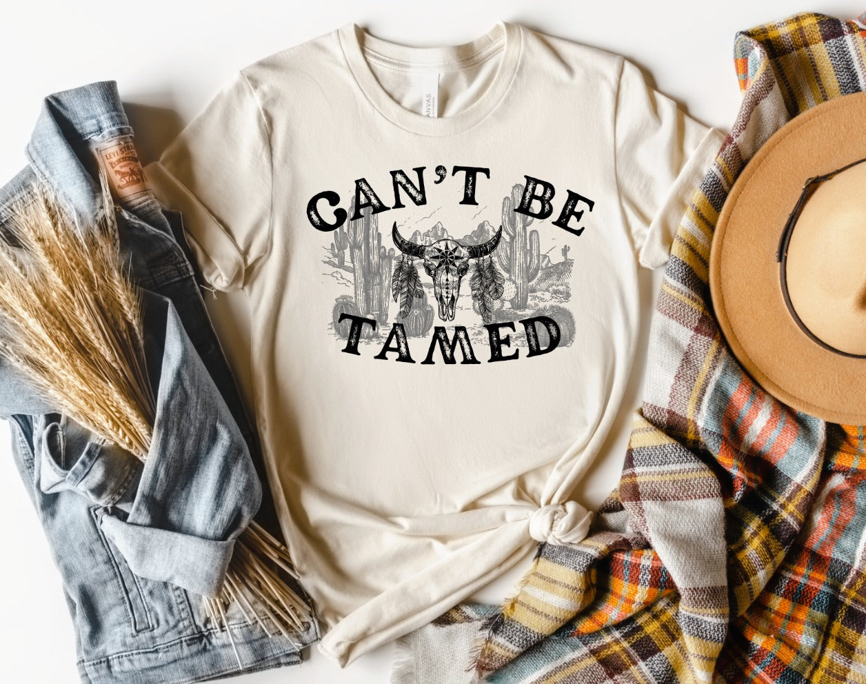 PREORDER: Can't Be Tamed Graphic Tee