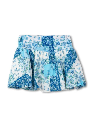 Feminine, fun, and made for movement, the Bluebell Patchwork Skort is your go-to for effortless style. Featuring a charming mix of blue floral patchwork prints, this piece brings a fresh, eye-catching look to any outfit. The flouncy silhouette adds a playful touch, while the built-in shorts underneath keep you comfortable and confident all day long. Easy to dress up or down, it’s perfect for everything from casual days out to active moments on the go.

Details:
Shell: 100% Nylon
Lining: 85% Polyester / 15% 
