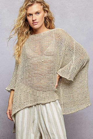 Effortlessly elegant with a naturally relaxed feel, the Bare Grace Knit Top is designed for lightweight comfort and understated style. Featuring a wide neckline that beautifully frames the shoulders, this top creates a soft, relaxed silhouette that drapes effortlessly.

Crafted from a natural loosely knitted fabric with a subtle open-mesh texture, it offers breathability and a lightweight feel that’s perfect for layering in warmer seasons. 