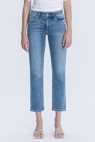 Classic, clean, and effortlessly flattering — the Vervet Signature Slim Straight Jeans are a timeless staple for your everyday wardrobe. Designed with a comfortable mid-rise fit, these jeans provide a smooth, flattering silhouette while offering the perfect amount of stretch for all-day wear.

The ankle-length slim straight leg creates a polished look that pairs easily with sneakers, sandals, or heels. Finished in a versatile medium wash, these jeans are perfect for dressing up with a blouse.