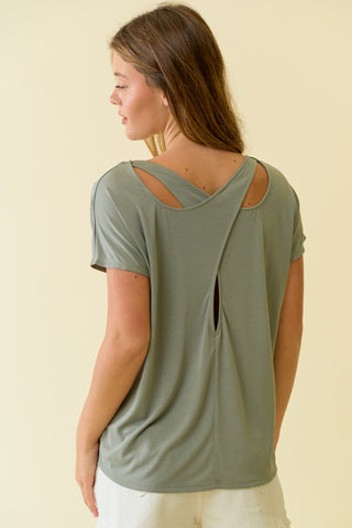 Simple from the front, elevated from the back—the Relaxed Refinement Shirt is an easy everyday essential with a modern twist. Designed with a relaxed fit and a unique back strap cutout detail, this top adds just the right amount of interest while staying effortless and comfortable. The soft modal-blend fabric drapes beautifully and feels amazing on the skin.

Perfect for casual days, layering, or dressing up your everyday basics.

Details:

Relaxed, easy fit

Short sleeves

Unique back strap with cutout 