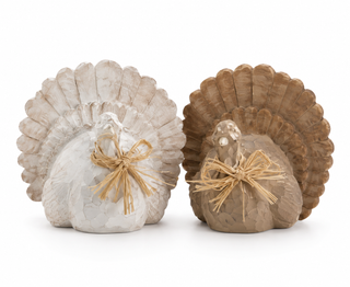 Bring a little farmhouse charm to your fall decorating with our Harvest Charm Turkey Décor. Featuring a textured, carved-inspired finish, a beautiful fanned tail, and a natural raffia bow, this sweet turkey is the perfect addition to your Thanksgiving and autumn displays. Its neutral color palette makes it easy to mix in with pumpkins, greenery, and your favorite seasonal pieces.

Display it on a mantel, shelf, entryway table, or use it as part of your Thanksgiving centerpiece.

Details:

Textured turkey de