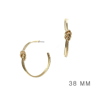 A bolder take on a classic gold hoop! These statement earrings feature a twisted rope texture with a chic knotted accent, giving you just the right amount of detail while still being easy to style with any outfit.

Details

Gold-tone finish
Twisted rope texture
Knotted accent
Hoop style
Approximately 1.5" in size
Post-back closure

FINAL SALE ITEM.