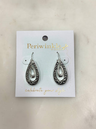 Classic elegance meets intricate detail with these timeless teardrop earrings. Featuring silver-tone teardrop silhouettes accented with delicate filigree-inspired detailing and a polished inner drop, this pair adds graceful movement and refined shine to any look. Lightweight and comfortable to wear, they’re perfect for everyday styling or dressing up your outfit with a touch of vintage-inspired charm.