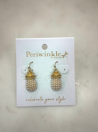 Playful with a polished twist, the Pearl Pineapple Drop Earrings feature a gold-tone pineapple top paired with a textured pearl-beaded drop. Fun, flirty, and full of charm, these earrings add the perfect pop to summer outfits, vacation looks, or anytime you want a little tropical flair.

Details
• Gold-tone pineapple design
• Pearl beaded drop
• Lightweight & comfortable
• Dangly silhouette with movement
• Hook back closure

✨ Perfect for beach days, brunch, vacations, or adding a fun statement to a simple 