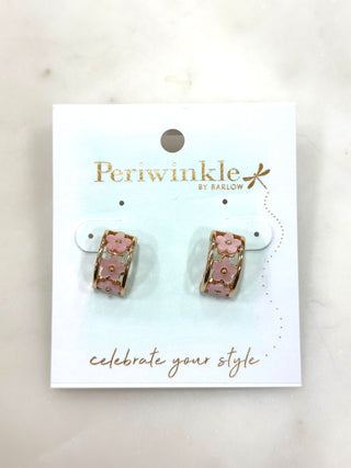 The Pink Bloom Huggie Earrings feature delicate pink floral details set in a gold-tone huggie design for a sweet yet polished look. Lightweight and comfortable, these earrings add a soft pop of color while remaining easy to wear from day to night. A charming style that pairs perfectly with both casual and dressy outfits.

DETAILS:

Floral accent huggie earrings

Pink flower details

Lightweight and comfortable

Gold-tone finish

Huggie closure

A feminine touch that adds effortless charm to any look.
