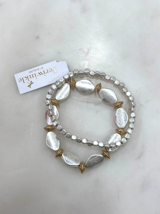 The Mixed Metal Stretch Bracelet Set features two coordinating stretch bracelets designed to be worn together or styled separately. With a blend of silver-tone beads and gold-tone accent details, this set adds texture and shine while remaining effortless and comfortable for everyday wear. An easy addition to dress up casual looks or complement layered wrist stacks.

DETAILS:

2-piece stretch bracelet set

Mixed silver-tone beads with gold-tone accents

Stretch fit for easy on and off

