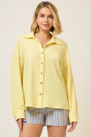 Soft, airy, and full of charm—the Summer Whisper Blouse is a standout warm-weather piece with an unexpected back detail. Designed with a lightweight textured fabric and a relaxed silhouette, this blouse features an open-back design accented with adjustable tie closures for a feminine, breezy finish.

Easy from the front and special from the back, this is the perfect top for sunny days and casual outings.

Details:

Lightweight textured fabric

Relaxed, easy fit

Long sleeves

Open-back detail with adjustabl