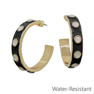 Sleek, bold, and effortlessly elevated — the Enamel Dot Hoop Earrings are a modern statement with playful polish. Designed with a smooth enamel finish accented by contrasting dot details and framed in a radiant gold-tone hoop, this pair brings color and structure together in a chic silhouette.

Available in multiple colorways, these hoops are lightweight yet substantial, making them easy to wear while still standing out. 