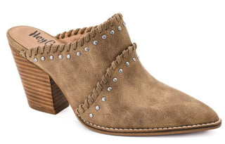 Bring a little western flair to your wardrobe with the Blame The Bar Wedge Mule. This tan slip-on mule features a pointed toe, silver-tone stud accents, and whipstitch detailing for the perfect rustic-chic finish. The chunky stacked heel gives you just the right amount of height while keeping this style easy to pair with everything from denim to dresses.

Details:

Tan
Slip-on mule style
Pointed toe
Silver-tone stud detailing
Whipstitch accents
Chunky stacked heel
Western-inspired design