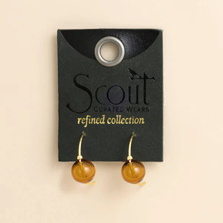 An easy pop of color, these glass hoop earrings pair beads with gold for a look that feels polished without trying too hard.

They are lightweight enough for regular wear and special enough to make a simple outfit feel finished. Add them to jeans, a dress, or whatever made it out of the laundry pile today.

Designed with high quality blown glass beads and clean lines, these minimal earrings bring together color, shape, and movement in the prettiest way. Scout Curated Wears also gives back 10% of net profits