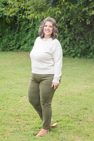 Stories Unfold Embroidered Sweater