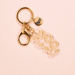 Show off your love for your furry best friend with this adorable acrylic keychain. Designed for both dog moms and cat moms, it’s the perfect little accessory to add personality to your keys, tote, or everyday bag. Cute, lightweight, and easy to clip on—this one is a must-have for every pet lover.

Details:

Durable, lightweight acrylic
Gold-tone hardware with lobster clasp & split keyring
Swivel attachment for easy use
Includes signature logo charm
Perfect for keys, bags, or backpacks
Available in Dog Mom &