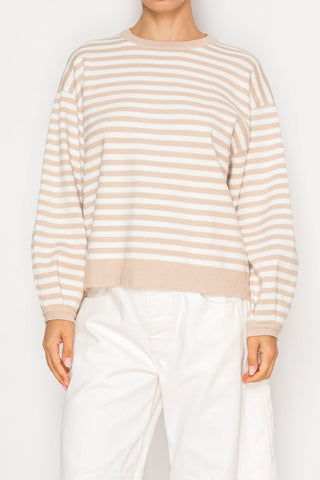 Cozy, classic, and effortlessly chic — the Driftwood Stripe Sweater is the perfect blend of comfort and everyday style. Featuring soft neutral stripes, this sweater offers a timeless look that pairs beautifully with denim, shorts, or casual trousers.

Designed with a relaxed silhouette and soft knit feel, it’s ideal for layering on cooler days or throwing on for a casual outing. The ribbed neckline, cuffs, and hem add a polished touch while keeping the fit comfortable and flattering.

DETAILS:

• Soft knit